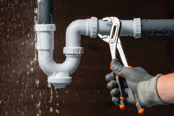 Professional Drain Cleaning technician working in Farmers, KY